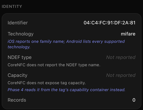 修复前应用的 Tag Info 界面。Capacity 显示"Not reported"，附解释"CoreNFC does not expose tag capacity"，并注明后续阶段将改为从标签的 capability container 中读取。
